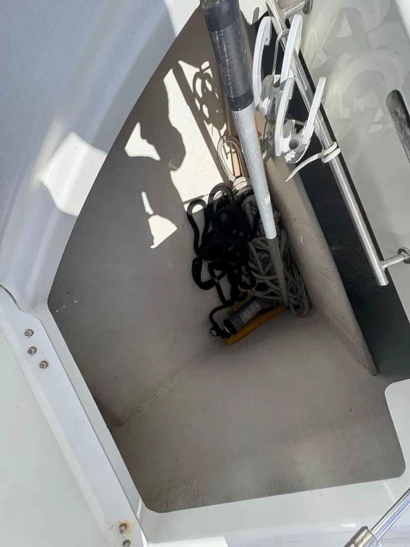 Slide: The Image of Storage compartment on a 2018 Prestige 680 yacht with ropes and equipment. - 49