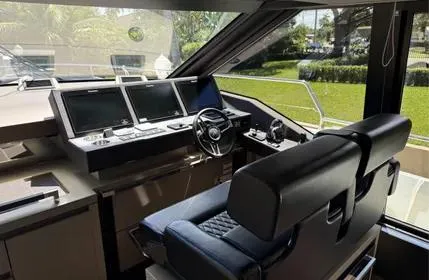 Slide: The Image of Luxurious helm of 2018 Prestige 680 yacht with modern navigation systems. - 5