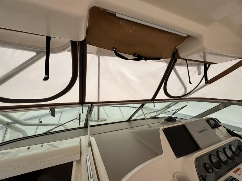 Slide: The Image of Interior view of 2006 Wellcraft 290 Coastal boat cockpit with navigation equipment. - 19