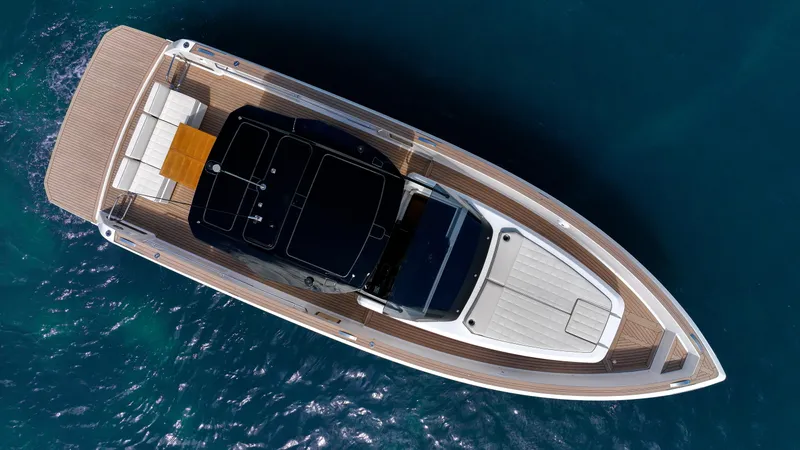 Slide: The Image of 2025 Pardo Yachts 38, aerial view, sleek design, cruising on blue ocean waters. - 3