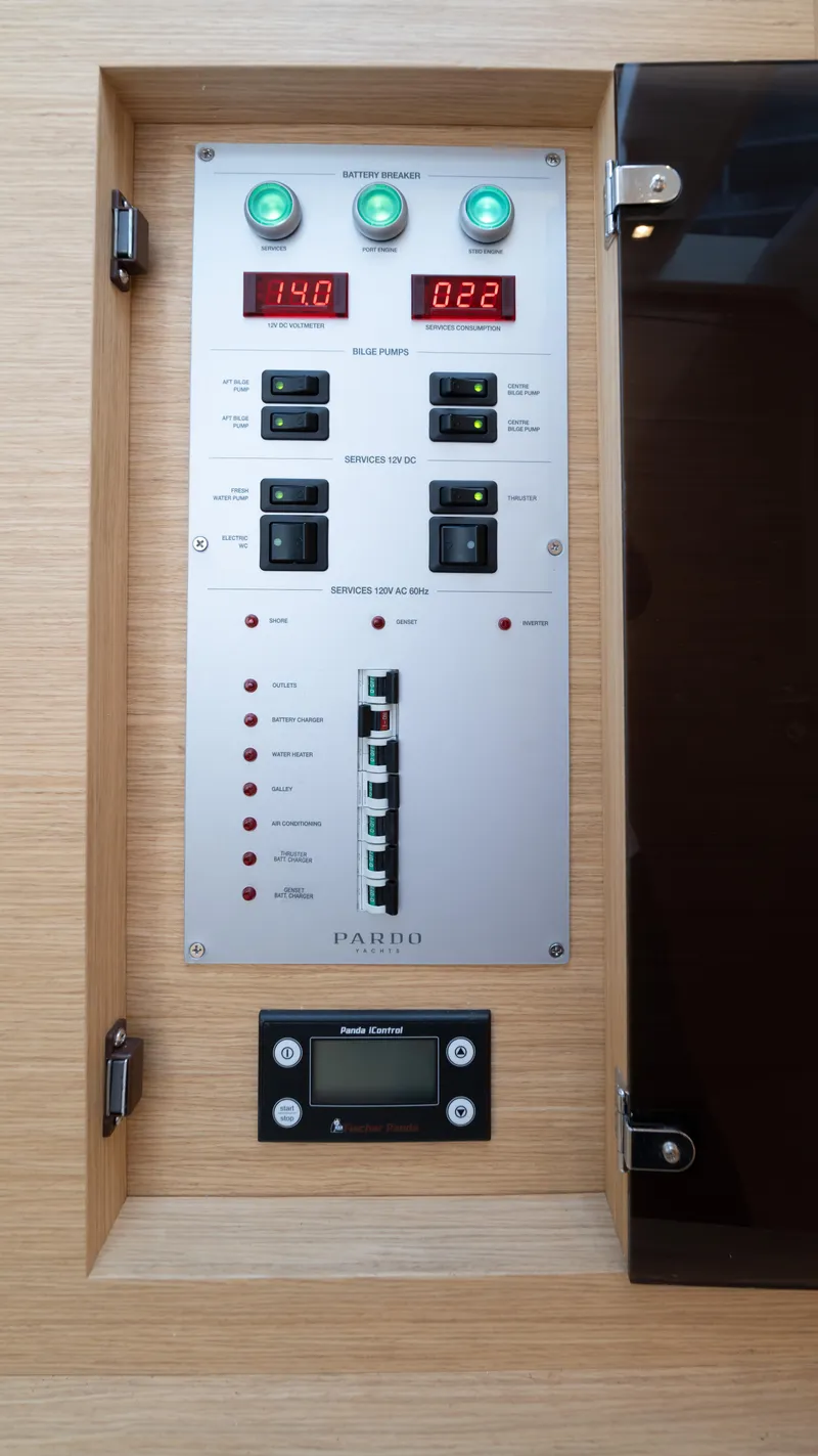 Slide: The Image of Control panel of 2025 Pardo Yachts 38, featuring digital displays and switches. - 40
