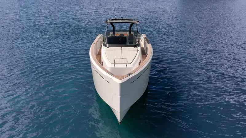 Slide: The Image of 2025 Pardo Yachts 38 on calm blue water, front view. - 8