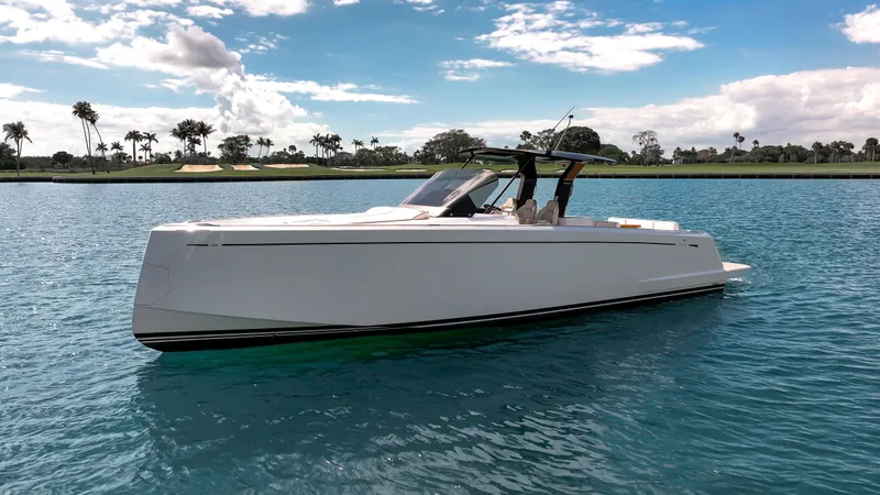 The Image of 2025 Pardo Yachts 38 cruising on a sunny day with palm trees in the background. - 0