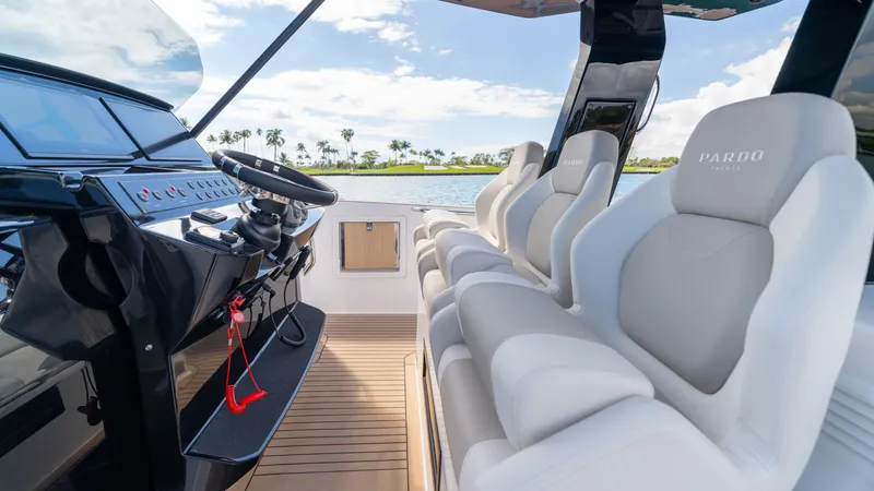 Slide: The Image of 2025 Pardo Yachts 38 interior with sleek helm and luxurious seating. - 30
