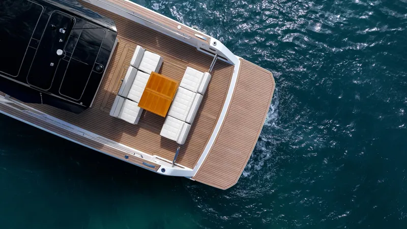 Slide: The Image of Aerial view of 2025 Pardo Yachts 38 on water, featuring elegant deck seating. - 42