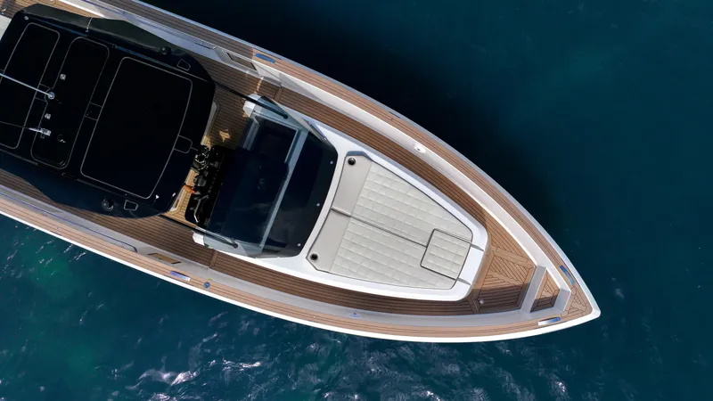 Slide: The Image of 2025 Pardo Yachts 38, aerial view, sleek design, cruising on blue water. - 7