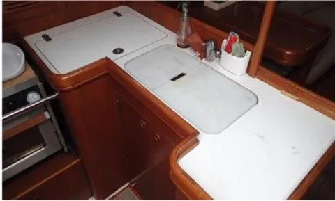 Slide: The Image of Interior view of 2002 Beneteau Oceanis Clipper 361 yacht kitchen area. - 15