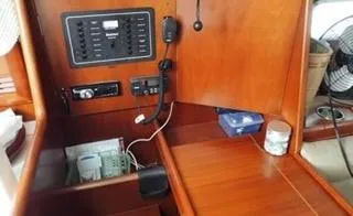 Slide: The Image of Interior of 2002 Beneteau Oceanis Clipper 361 yacht with navigation equipment and wooden finish. - 20