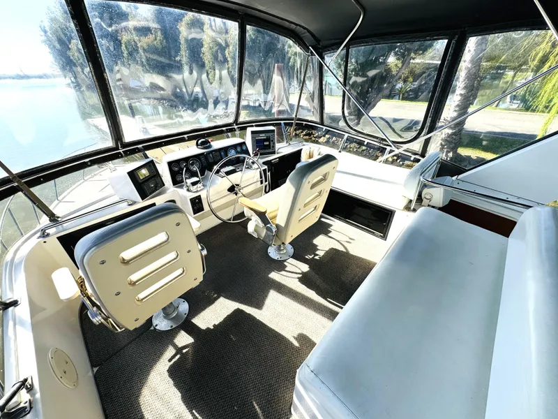 Slide: The Image of Cockpit of 1991 Ocean Alexander 440 Sundeck CPMY with dual helm seats and panoramic windows. - 27