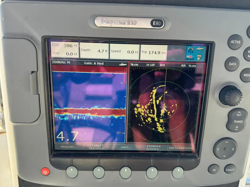 Slide: The Image of Raymarine E80 marine display showing sonar and radar data on Ocean Alexander 440 Sundeck CPMY, 1991. - 33