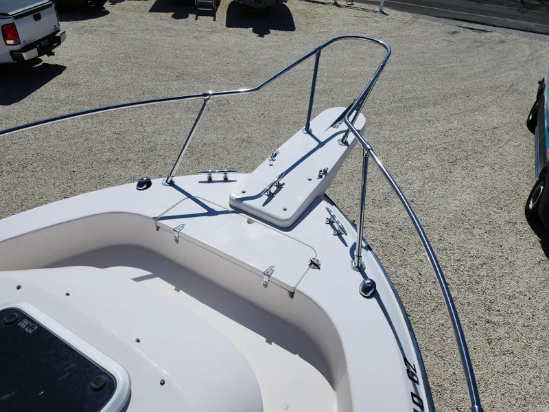 Slide: The Image of 2006 Grady-White Journey 258 boat bow with stainless steel railings and anchor platform. - 10