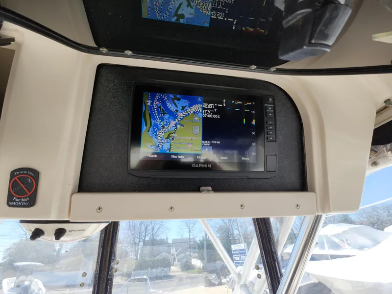 Slide: The Image of Garmin navigation system on 2006 Grady-White Journey 258 boat dashboard. - 17