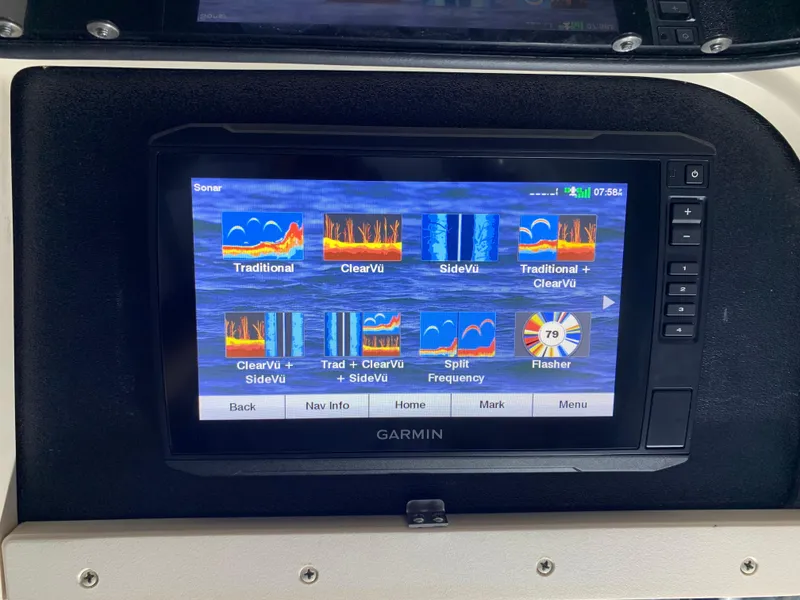 Slide: The Image of Garmin sonar display on 2006 Grady-White Journey 258 boat dashboard. - 18