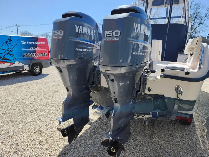 Slide: The Image of 2006 Grady-White Journey 258 with twin Yamaha 150 four-stroke outboard engines. - 32