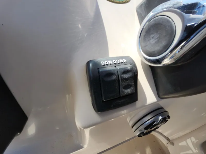 Slide: The Image of Control panel on 2006 Grady-White Journey 258 boat, featuring "Bow Down" button. - 36