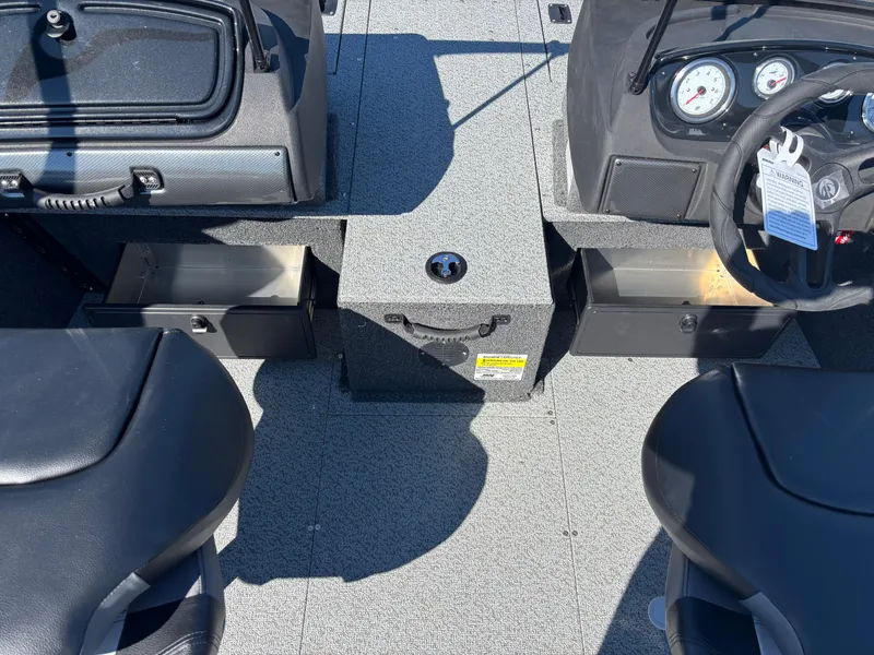 Slide: The Image of 2025 Crestliner 1750 Hawk boat interior with dual seats and dashboard controls. - 11