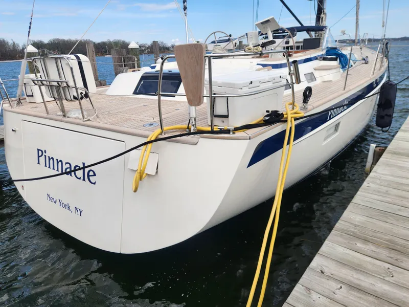 Slide: The Image of 2023 Hallberg-Rassy 57 sailboat docked, named "Pinnacle," New York, NY. - 8