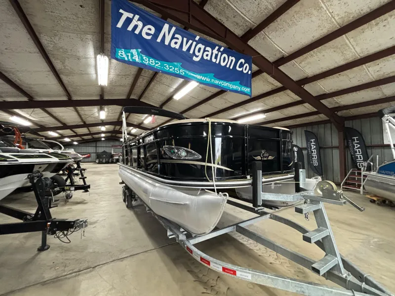 Slide: The Image of 2017 Bentley Pontoons 220 Elite Admiral in showroom, displayed on trailer. - 10