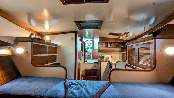Slide: The Image of Interior of 1990 Stanley 36' Downeast Fly Bridge Cruise with cozy cabin layout. - 22