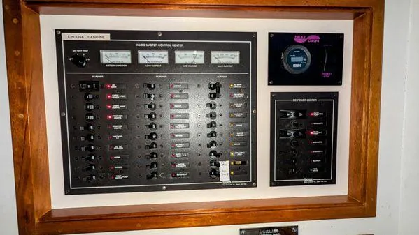 Slide: The Image of Electrical control panel on a 1990 Stanley 36' Downeast Fly Bridge Cruise. - 29