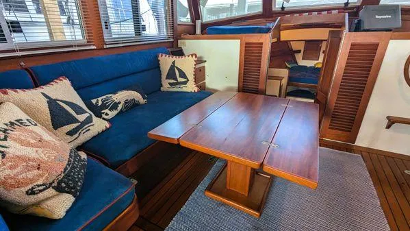 Slide: The Image of Interior of 1990 Stanley 36' Downeast Fly Bridge Cruise with nautical-themed decor. - 41