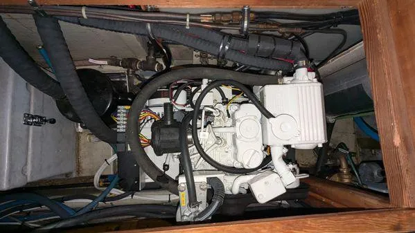 Slide: The Image of Engine compartment of a 1990 Stanley 36' Downeast Fly Bridge Cruise boat. - 48