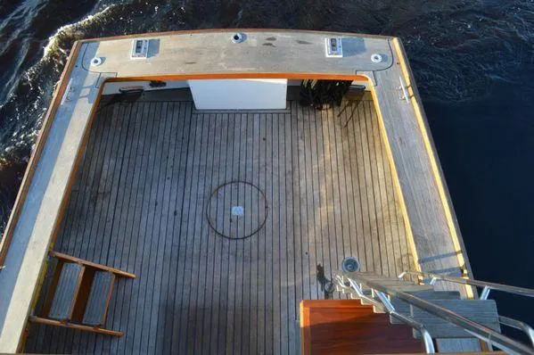 Slide: The Image of Stanley 36' Downeast Fly Bridge Cruise, 1990, wooden deck, aerial view. - 8