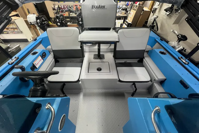 Slide: The Image of Interior view of 2026 SeaArk Easy 200 boat with seating and steering wheel. - 22