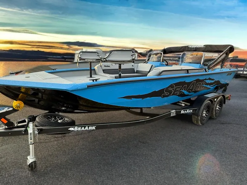 Slide: The Image of 2026 SeaArk Easy 200 boat interior with blue LED lighting and cushioned seating. - 7