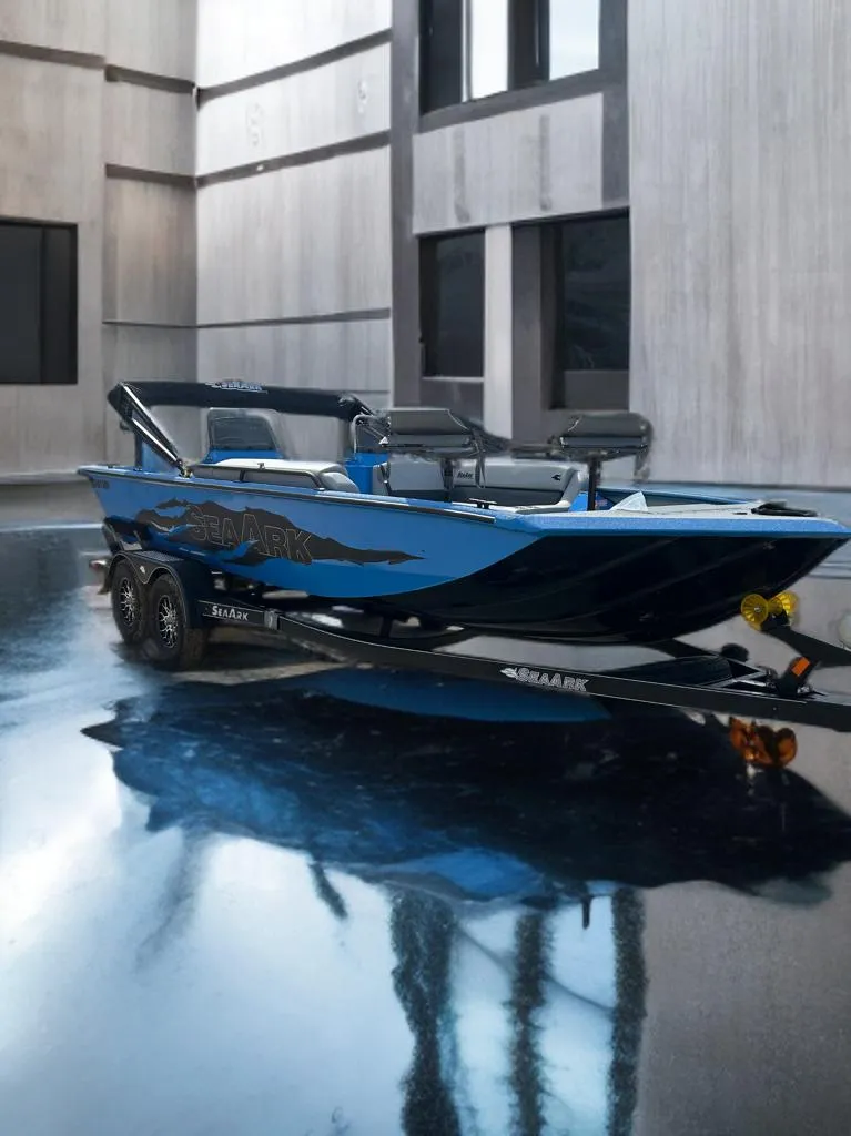 Slide: The Image of Blue-lit interior of 2026 SeaArk Easy 200 boat, featuring a sleek design. - 8
