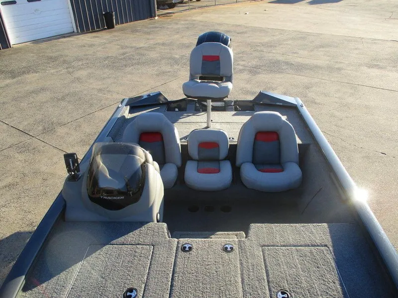 Slide: The Image of 2017 Tracker Pro Team™ 195 TXW boat interior with seating and console. - 5