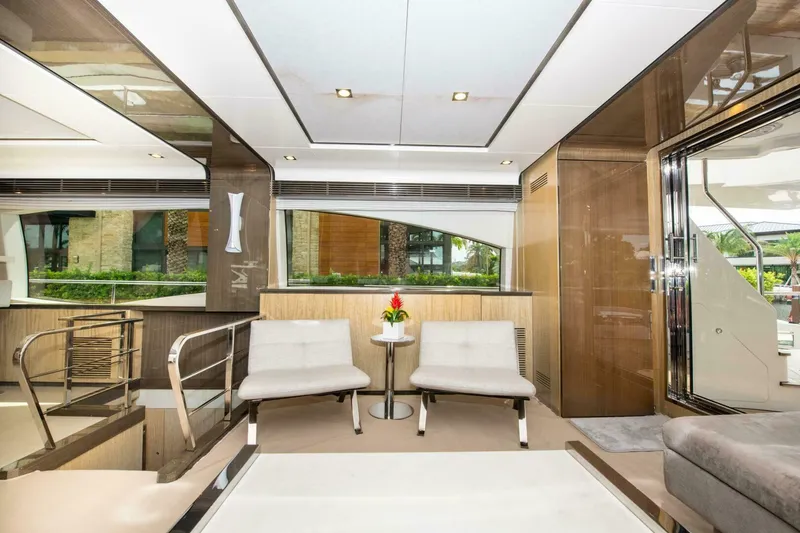 Slide: The Image of Luxurious interior of 2017 Azimut 84 Flybridge yacht with modern seating and elegant decor. - 12