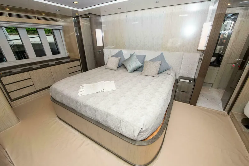 Slide: The Image of Luxurious bedroom interior of 2017 Azimut 84 Flybridge yacht with elegant bedding and decor. - 13