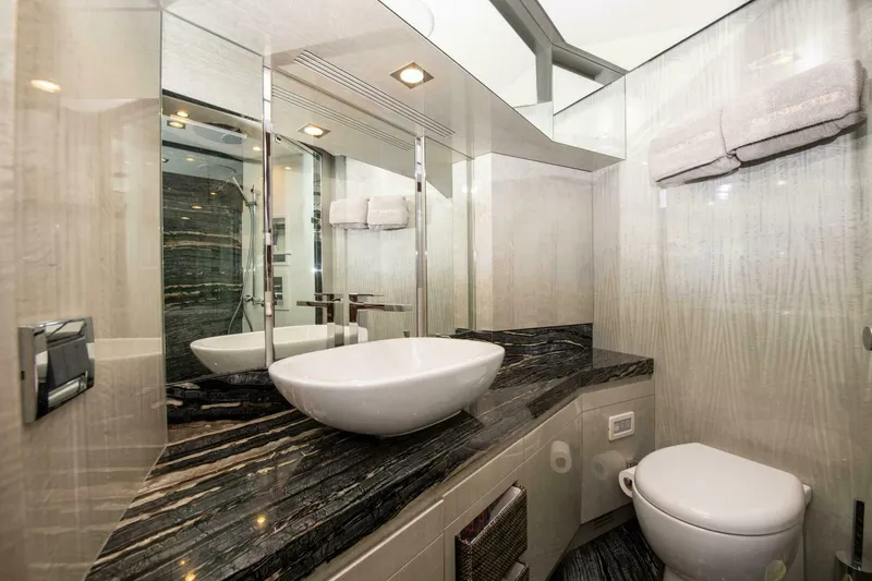 Slide: The Image of Luxurious bathroom in 2017 Azimut 84 Flybridge yacht with modern fixtures and elegant design. - 17