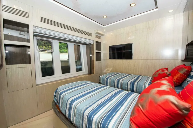 Slide: The Image of Luxurious cabin interior of 2017 Azimut 84 Flybridge yacht with twin beds and modern decor. - 18