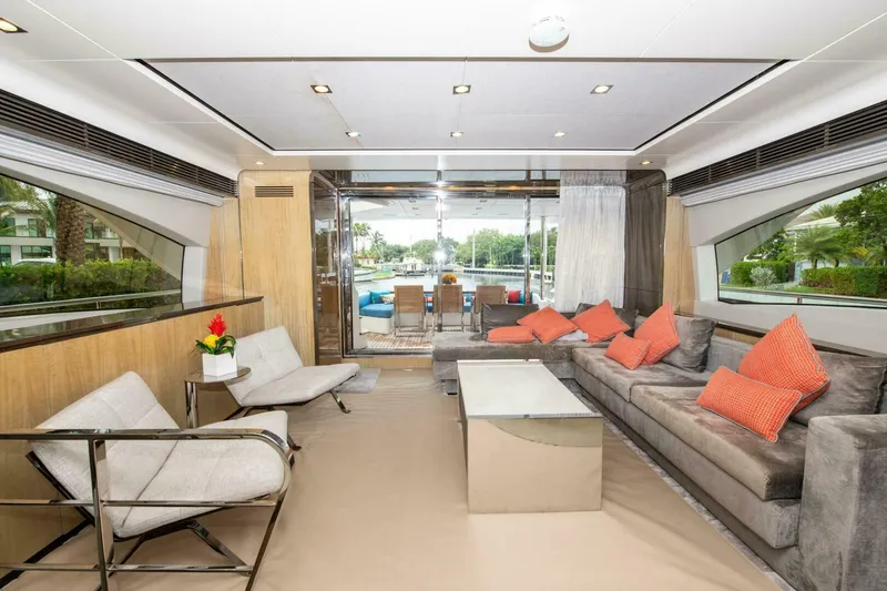 Slide: The Image of Luxurious interior of 2017 Azimut 84 Flybridge yacht with modern furnishings and vibrant accents. - 7