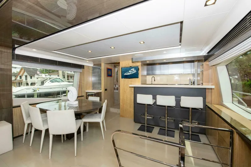 Slide: The Image of Luxurious interior of 2017 Azimut 84 Flybridge yacht with dining area and modern kitchen. - 8