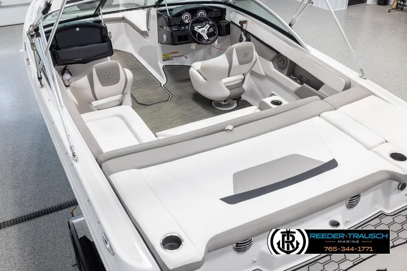 Slide: The Image of 2019 Four Winns HD200 boat interior with modern seating and steering console. - 11