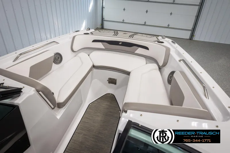 Slide: The Image of 2019 Four Winns HD200 boat interior with white seating and gray accents. - 19