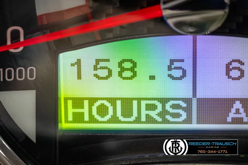 Slide: The Image of Dashboard display showing 158.5 hours on a 2019 Four Winns HD200 boat. - 34