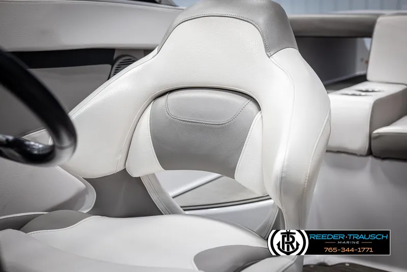 Slide: The Image of 2019 Four Winns HD200 boat interior with white and gray seating. - 36