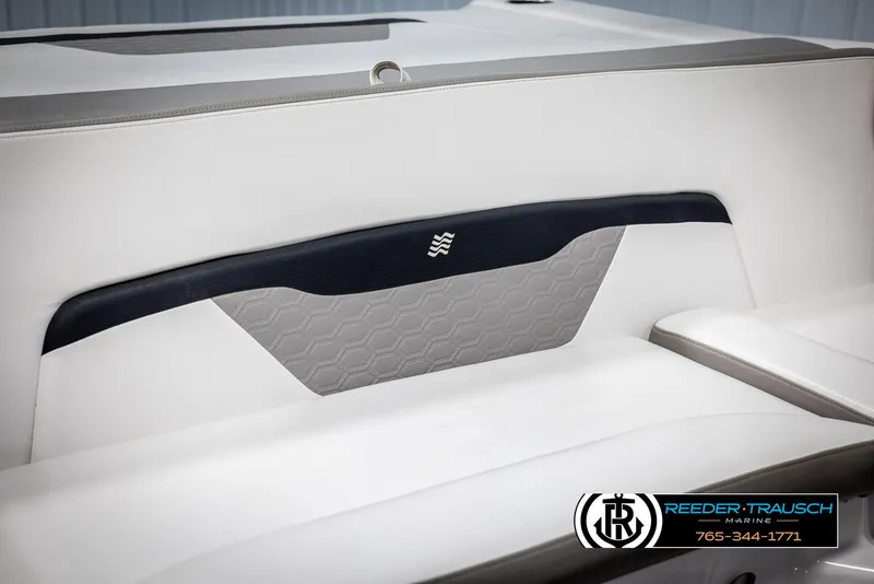 Slide: The Image of 2019 Four Winns HD200 boat interior with white and gray seating. - 40