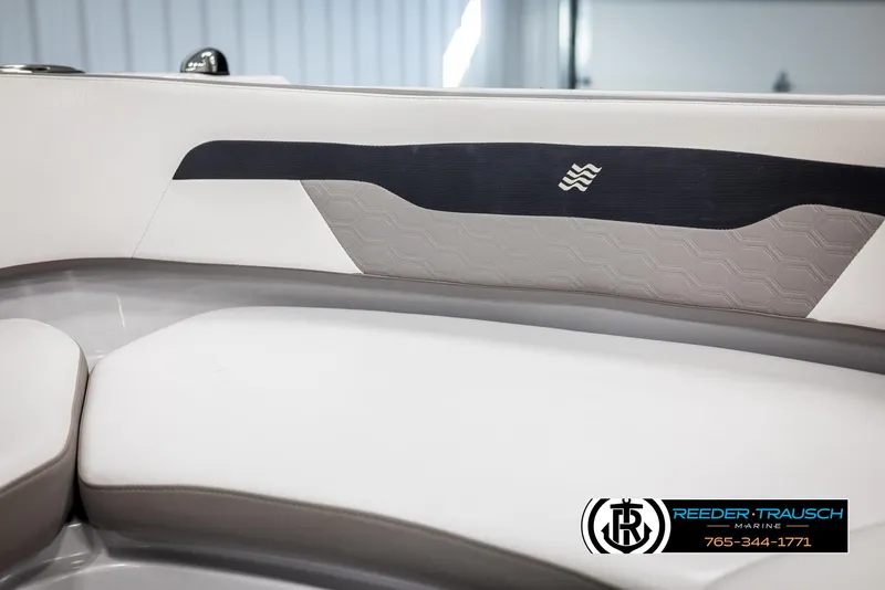 Slide: The Image of 2019 Four Winns HD200 boat interior with sleek white and gray seating design. - 41