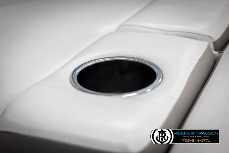 Slide: The Image of 2019 Four Winns HD200 boat cup holder on white upholstery. - 42