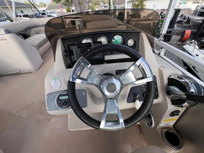 Slide: The Image of Steering console of 2013 Harris FloteBote Sunliner 220 pontoon boat. - 19