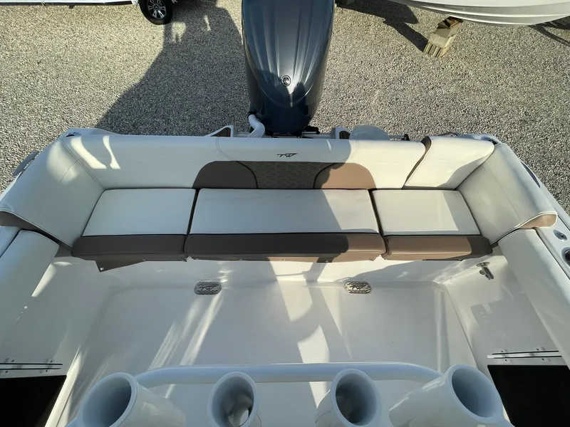 Slide: The Image of 2025 Tidewater 232 SS boat interior with dual seats and steering console. - 39