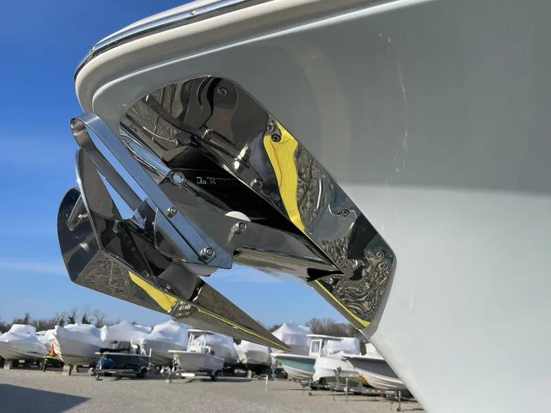 Slide: The Image of 2025 Tidewater 232 SS boat anchor detail with other boats in the background. - 4