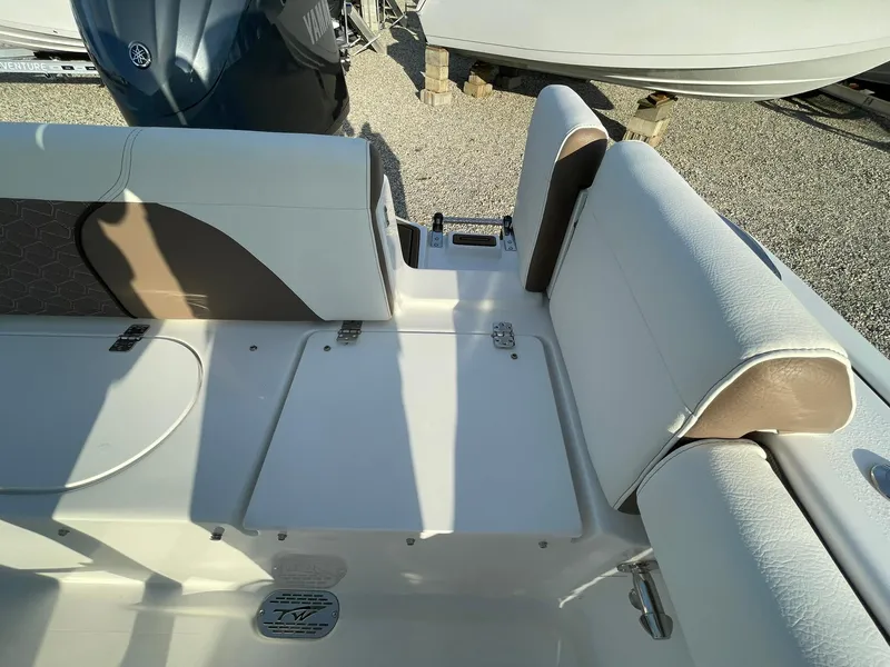 Slide: The Image of 2025 Tidewater 232 SS boat raw water outlet with chrome finish. - 46