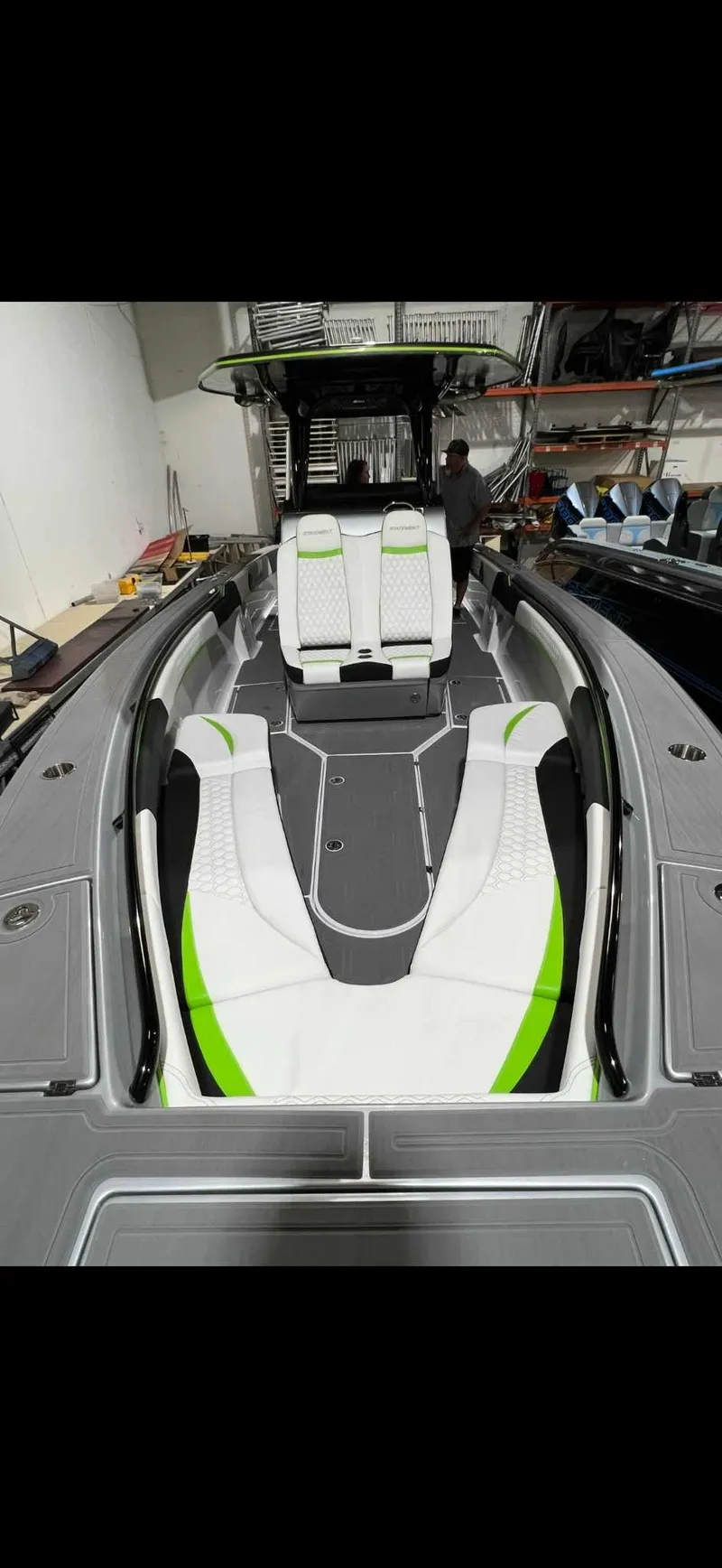 Slide: The Image of 2024 Statement 350 Open boat interior with sleek seating and modern design. - 28