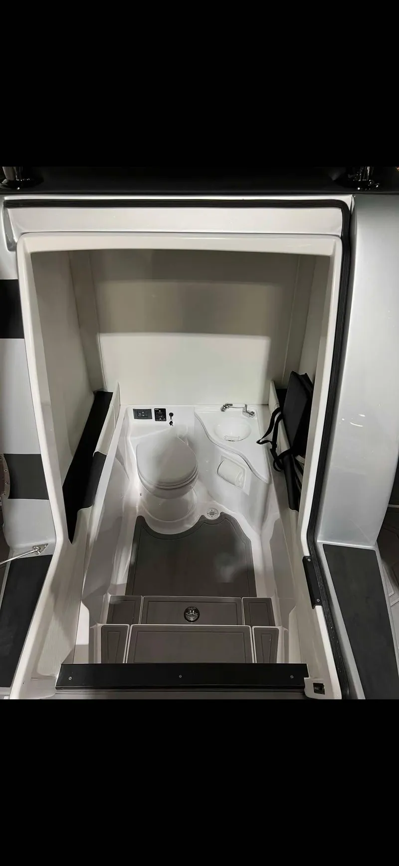 Slide: The Image of 2024 Statement 350 Open boat interior with modern amenities and sleek design. - 31